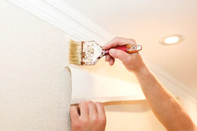 Pose de papier peint à Charbogne — revêtements muraux et toiles de verre